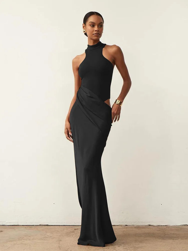 Vestido Negro Satinado de un Hombro con Abertura.