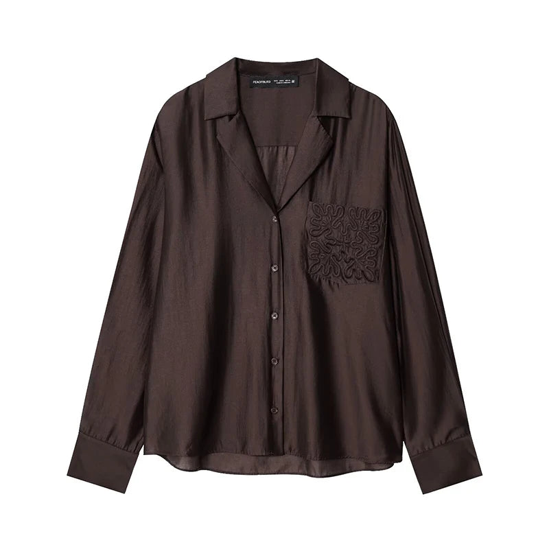 Blusa Satinada Elegante.